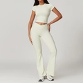 Eco-friendly quick-dry cream yoga set with short sleeve crop top and flared leggings - S / Top And Bottom / Short Sleeve + Flare Pants / Cream Apricot