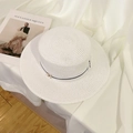 White woven straw boater hat with black ribbon band and golden M emblem accessory - Cream Metal M Black Band