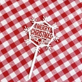 Close-up of red and white acrylic snowflake cake topper with Merry Christmas cutout - Snowflake 1 Red White Merry Christmas