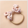 Floral print baby bow headband with soft nude nylon band for infants and toddlers - Brown Plant Floral