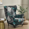 Grey and teal geometric patchwork stretch wingback chair cover on a tiger chair - Vintage Gray Geometric