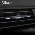 Elegant silver car vent clip air freshener mounted on a black dashboard grille - Silver Holder