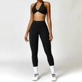 Two-piece black yoga set with twist front halter bra and high-waisted leggings - S / Top And Bottom / Premium Black
