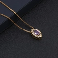 Detail of gold box chain necklace featuring a purple teardrop zircon pendant - Purple