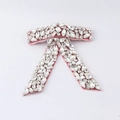 Macro detail of a pink velvet bow accessory encrusted with rhinestones and crystals - Light Pink Velvet with Full Rhinestones