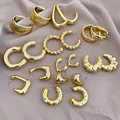 Flat lay of 20-piece gold C-shape earring set on premium champagne silk fabric - 41# Silver Pin (20-Piece Set) / Gold