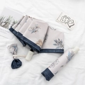 Beige floral automatic folding umbrella with a matching storage bag and wrist strap - 3-Fold Automatic Style - Lily of the Valley