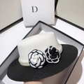 Detailed close-up of straw hat featuring pearl beads and camellia flower accents - Adjustable / White Top