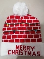Christmas LED knitted hat in red and white with Merry Christmas text and pompom - Plaid Pattern with Lights