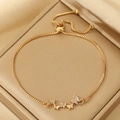 Gold butterfly bracelet with box chain and adjustable bolo clasp featuring clear crystals - Gold Butterfly Bolo Bracelet (5898)
