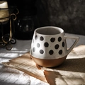 Minimalist ceramic mug with black polka dots and rustic brown base for home coffee - Dot / Cream/Brown