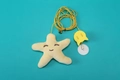 Plush yellow star cat toy with elastic string, bell and suction cup for hanging - Starfish Star