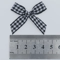 Zwart-wit geruite strik van 46 mm breed met nauwkeurige meting op een liniaal - Zwart en Wit Geblokt