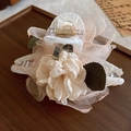 Elegant beige lily hair claw with pink mesh fabric and green leaves on wooden tray - Champagne Claw Clip (155#)