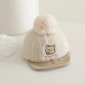 Dettaglio del cappellino da orsetto neonato con pile beige e tesa in velluto a coste - 48-50cm (1-2 anni) / Bianco Sporco