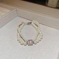 Elegant double-layered pearl bracelet featuring a square iridescent gemstone and silver clasp - Double Layer Blue Gem Pave Diamond Style