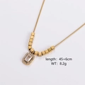 Detail view of gold rectangle pendant with green stone and dimensions 45+6cm - Rectangle White Zirconia Pendant