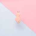 Macro shot of polished rose gold cat silhouette pendant for DIY jewelry making - Rose Gold