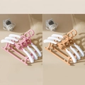 Pink and beige non-slip baby clothes hangers with cartoon bear design for infant clothing - Baby Pink