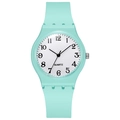 Macro detail of mint green silicone watch strap and minimal white dial with quartz movement - Mint Green