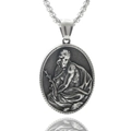 Macro detail of oval stainless steel pendant with vintage religious portrait and chain - Jesus with Plant