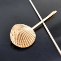 Golden seashell hair clip with detailed radial texture and metallic finish on dark background - Single Shell Bobby Pin / Gold