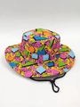Detail of colorful geometric pattern bucket hat with black windproof cord and side air vents - Colorful Geometric