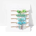 Detailweergave van 5 natuurlijke kristallen haarspelden op witte kaartverpakking - Blauw & Groen