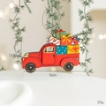 Red wooden Christmas truck ornament with gift boxes and golden string hanging on a tree - Gift Box Wooden Car