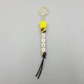Detail of MAMA letter silicone beads with sunflower pattern and black suede tassel keychain - Yellow Sunflower Tassel Style