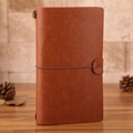Vintage brown leather traveler's notebook with elastic closure and copper bead detail - Brown Traveler's Notebook