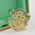 Gold daisy scarf buckle ring with blue and iridescent crystals on green gift box - Blue Daisy Hollow