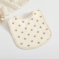 U-shaped baby bib in cream cotton gauze featuring cute brown heart pattern print - Brown Heart
