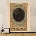 Detail of The New Moon tarot tapestry with a black cat design on a textured wall - 73X95CM / New Moon Cat - Brushed Fabric