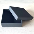 Classic matte black jewelry gift box with soft foam insert on light wood background - 9x9x3 Large Black