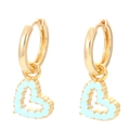 Detail of light blue enamel heart earrings with elegant gold-tone metal plating - Light Blue