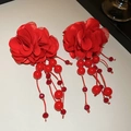 Detail of red fabric flower earrings with beaded tassels in festive and elegant style - Silver Needle Red Flower Tassel Earrings