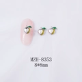 Detail of 3D alloy peach nail charms with green enamel leaves on pink manicure - Silver Yellow Dot Peach (White K Base) (8353)
