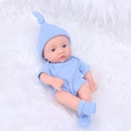 Reborn baby doll in blue knitted outfit on white plush surface, 20cm mini doll toy - Blue Sweater
