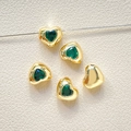 Vista macro de cuentas espaciadoras de corazón 18k con circonitas verdes para hacer joyas - 1# 18k Verde (Precio por unidad)