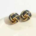 French vintage vortex earrings in black enamel and gold finish on ceramic plate - Black