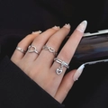 Set di 4 anelli a cuore in argento per donna con design traforato e charms in zircone - Set Anelli Impilabili a Cuore d'Argento Sweet Cool 4 Pezzi / Argento