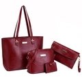 Detail of four-piece burgundy tote set featuring retro stone texture and gold metal hardware - One Size / Burgundy