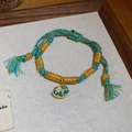 Détail du bracelet tressé rouge avec pendentif cheval en émail vert et perles dorées - 4# Bracelet-Or-Vert (Cheval à Bascule Turquoise)