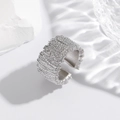 Detail of silver wide band ring with woven texture on a white stone background - Wide Irregular Hammered / Silver