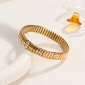 Pulsera elástica de acero inoxidable dorado con eslabones cuadrados y cristales - Estilo Zirconia de Tres Filas / Dorado