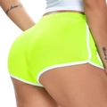 Women's athletic booty shorts in neon green with white trim for yoga and running - S / Grass Green