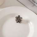 Deep grey translucent flower hair claw with green glitter and zircon center - Black Flower