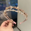 Detailed view of handmade crystal headbands in soft pink and champagne beige tones - Model B Double Row / Model B Double Row Pink