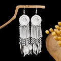 Bohemian silver long tassel earrings with geometric round disc and fish pendants - Floral Disc Fish Style E2320-1